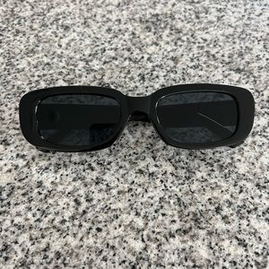 Round black sunglasses